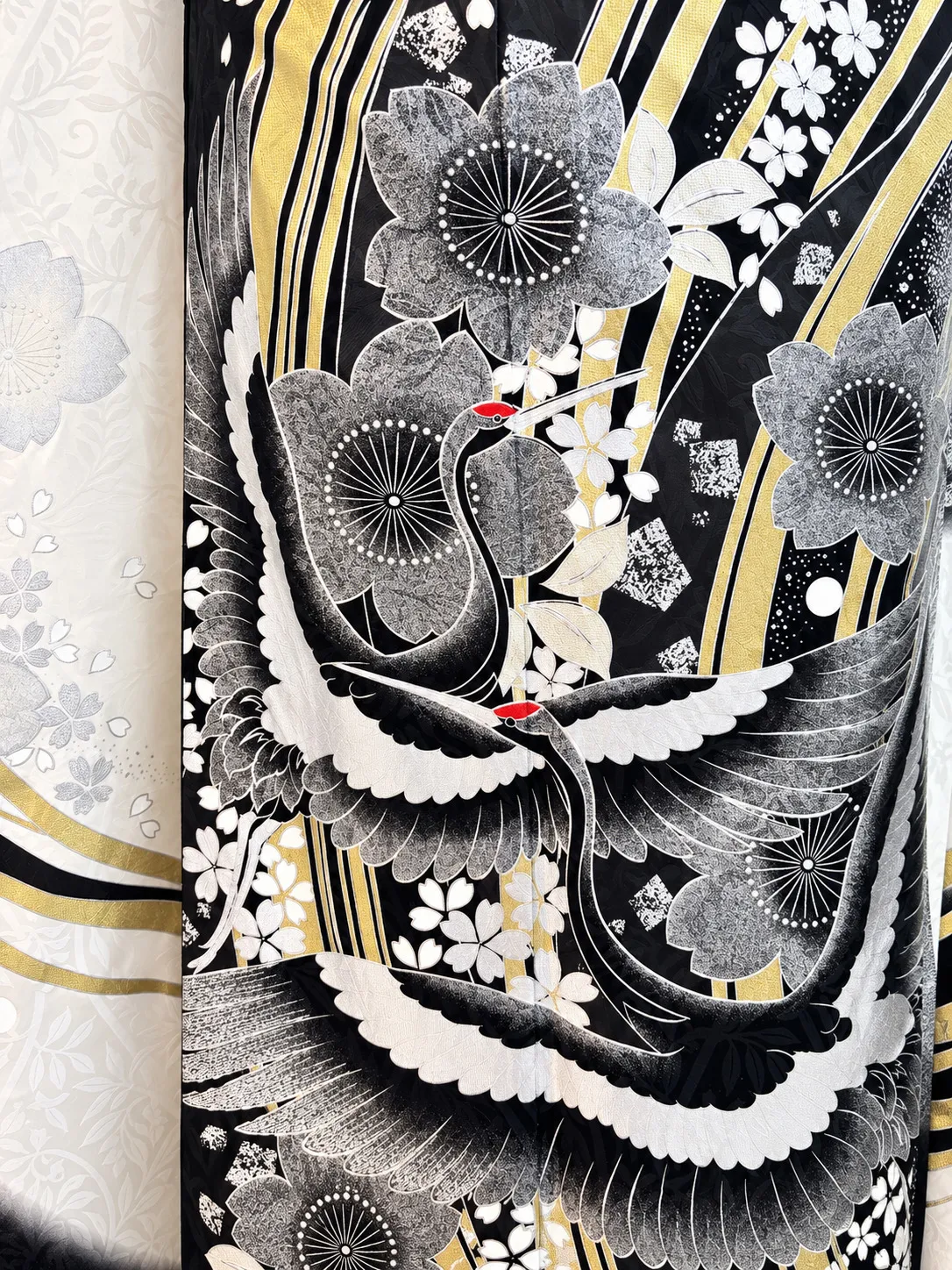 Close-up of the fabric and pattern of the Furisode Plan A — Gold kimono
